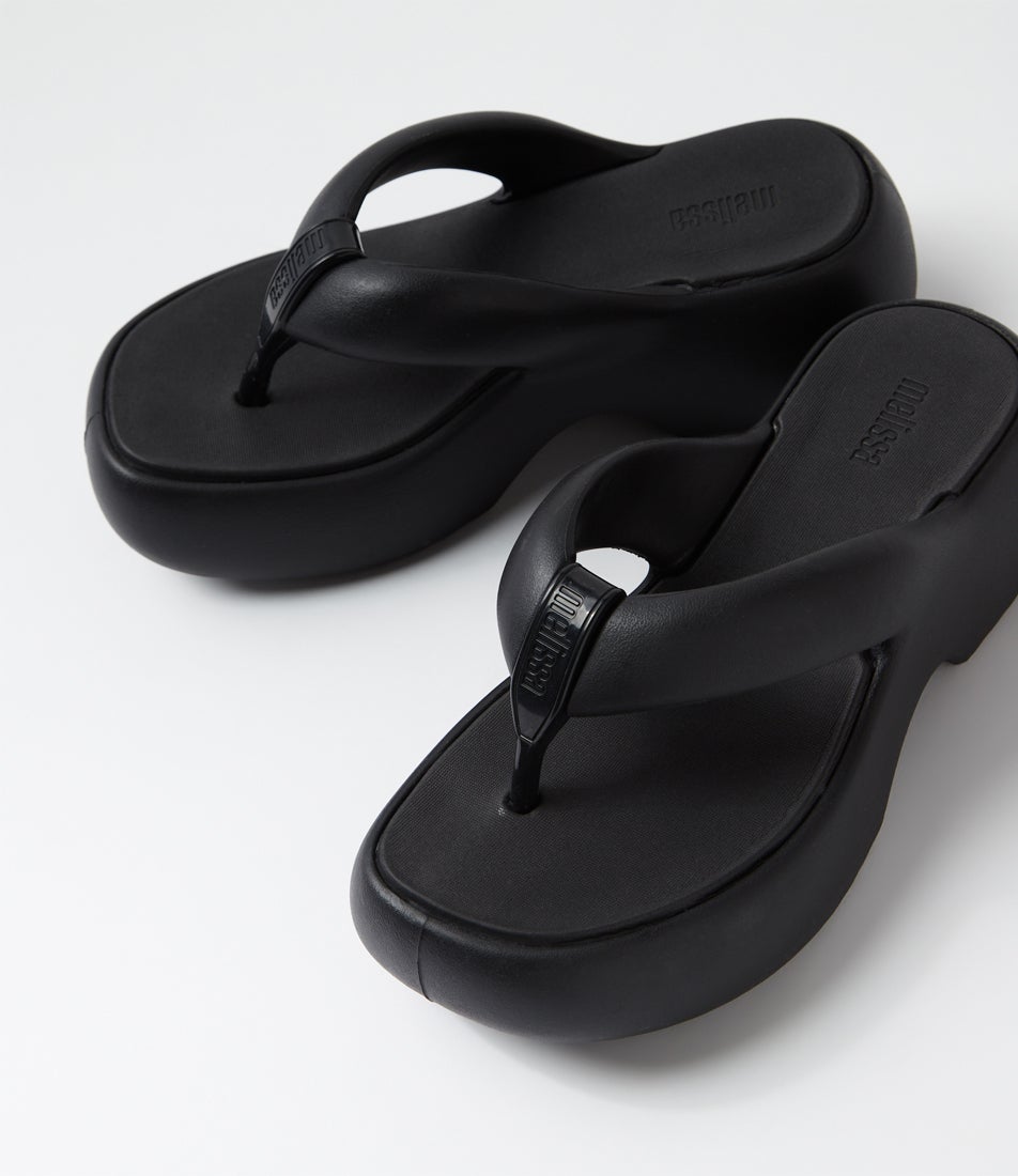 Free Fuzzy Platform Ad Black Sandals